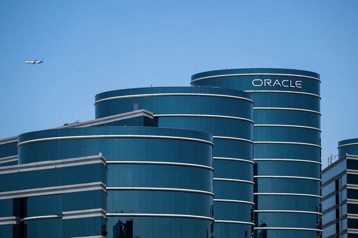 Photo for: Oracle Cut 21,000 Jobs in a Year. How Much of That Was Actually AI?
